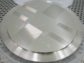 Hot-embossing stamp with various test features